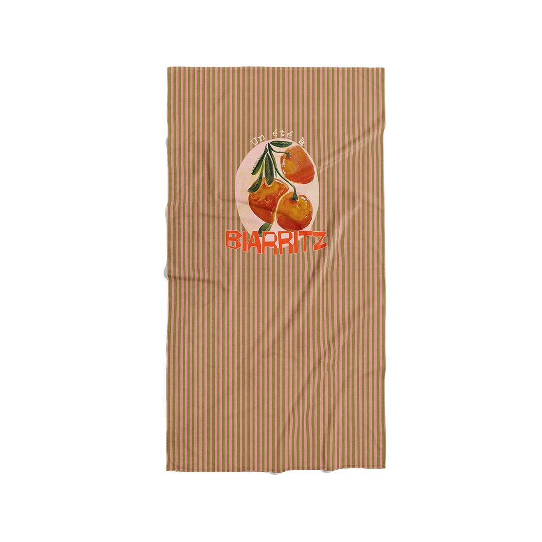 Serviette de plage rayée vert et rose motif oranges avec un texte personnalisable