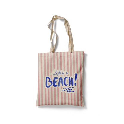 Tote Bag à rayures roses et blanches avec le texte bleu Life's a Beach