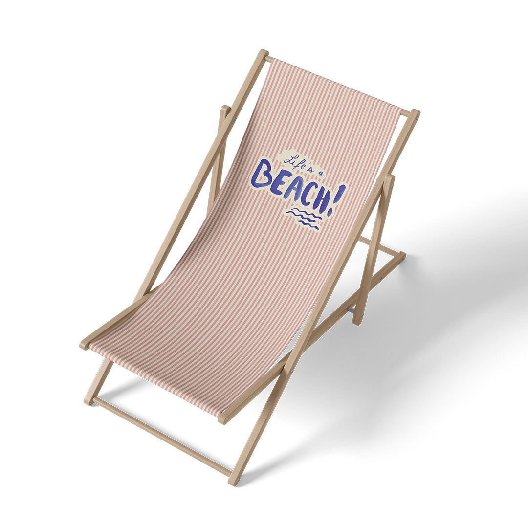 Transat à rayures roses et blanches avec le texte bleu Life's a Beach