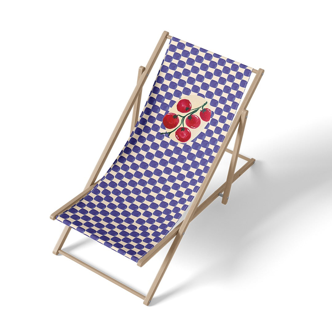 Transat motif damier bleu et blanc orné d'une grappe de tomates rouges